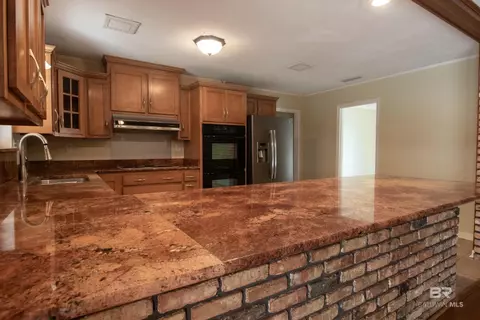 Kitchen - 213 Bell Ct, Chickasaw, AL 36611 photo 3 of 4