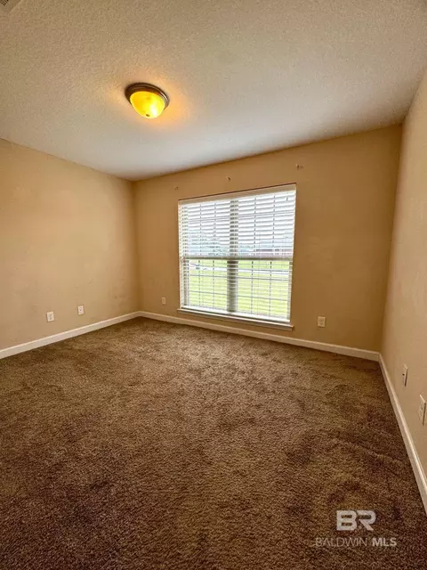 Bedroom - 10257 Lyttleton Loop, Lillian, AL 36549 photo 2 of 3