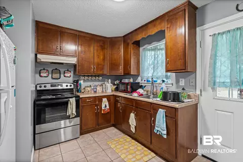 Kitchen - 14165 River Oaks Dr #A & B, Coden, AL 36523 photo 2 of 2