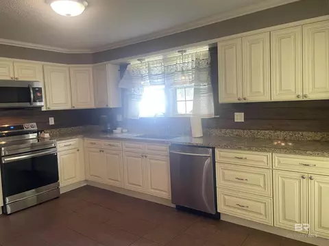 Kitchen - 13850 Celeste Rd, Chunchula, AL 36521 photo 4 of 4