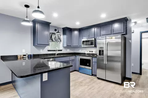 Kitchen - 36397 Alexandria Trl, Stapleton, AL 36578 photo 5 of 7