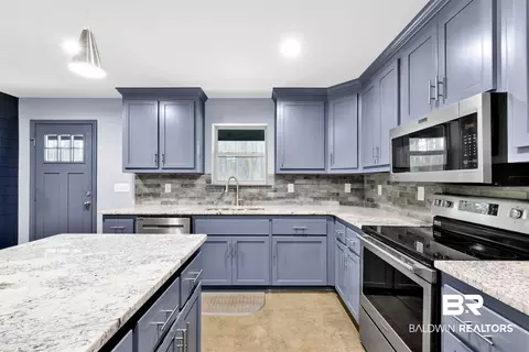 Kitchen - 36397 Alexandria Trl, Stapleton, AL 36578 photo 4 of 7