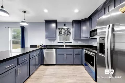 Kitchen - 36397 Alexandria Trl, Stapleton, AL 36578 photo 6 of 7