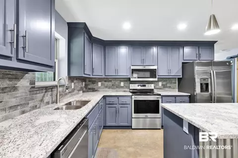 Kitchen - 36397 Alexandria Trl, Stapleton, AL 36578 photo 3 of 7