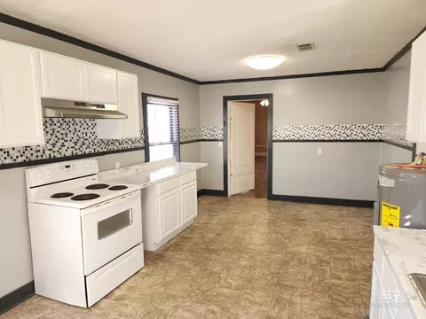 Kitchen - 706 E Horner St, Atmore, AL 36502 photo 1 of 6