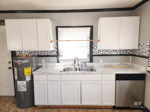 Kitchen - 706 E Horner St, Atmore, AL 36502 photo 5 of 6