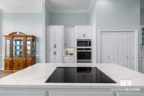 Kitchen - 32754 River Rd, Orange Beach, AL 36561 photo 8 of 9
