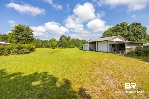 Exterior - 9596 Hildreth Dr, Perdido Beach, AL 36530 photo 9 of 18