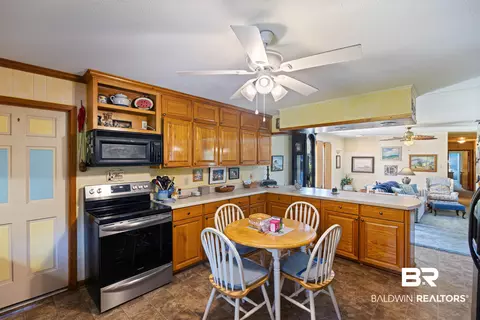 Kitchen - 9596 Hildreth Dr, Perdido Beach, AL 36530 photo 2 of 4