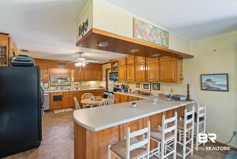 Kitchen - 9596 Hildreth Dr, Perdido Beach, AL 36530 photo 3 of 4