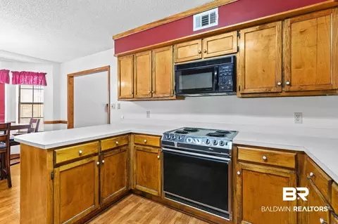 Kitchen - 110 Iris Cir, Daphne, AL 36526 photo 4 of 6