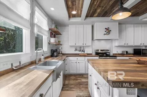 Kitchen - 8221 Mobile Ave, Perdido Beach, AL 36560 photo 3 of 5