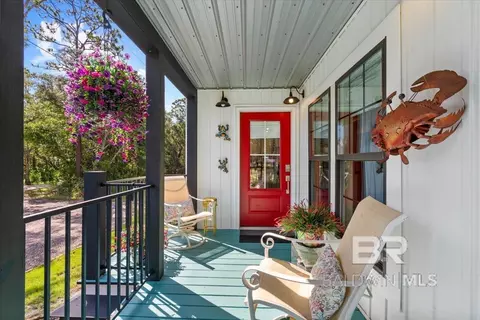 Exterior - 8221 Mobile Ave, Perdido Beach, AL 36560 photo 3 of 4