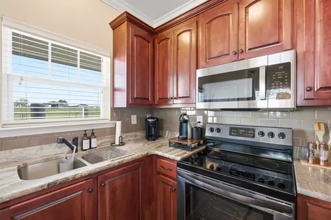 Kitchen - 8794 Baptist Cp, Elberta, AL 36530 photo 9 of 9
