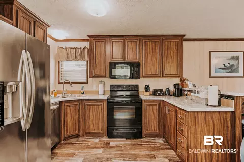 Kitchen - 25015 Pompano Dr, Elberta, AL 36530 photo 2 of 3