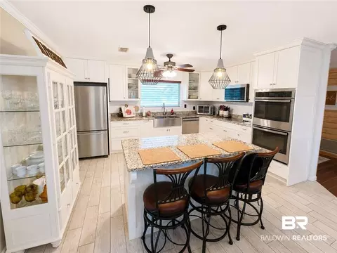 Kitchen - 12185 Celeste Rd, Chunchula, AL 36521 photo 1 of 8