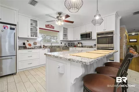 Kitchen - 12185 Celeste Rd, Chunchula, AL 36521 photo 2 of 8
