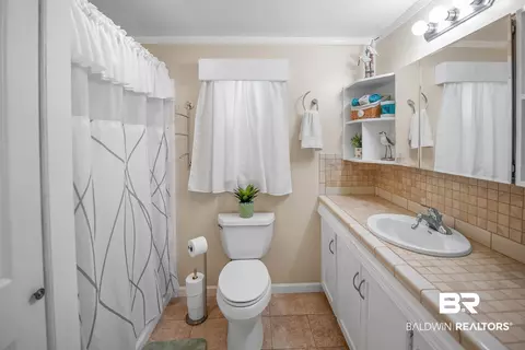 Bath - 483 Elberta Loop, Lillian, AL 36549 photo 1 of 2