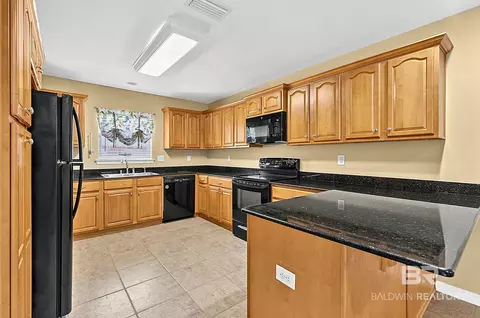 Kitchen - 24909 Steadfast Ct, Daphne, AL 36526 photo 2 of 7