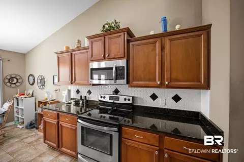 Kitchen - 231 Meadow Run Loop, Foley, AL 36535 photo 3 of 4