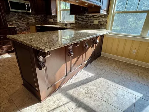 Kitchen - 504 Sutherland Dr, Chickasaw, AL 36611 photo 2 of 2