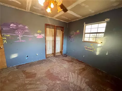 Bedroom - 322 4th St E, Atmore, AL 36502 photo 2 of 3