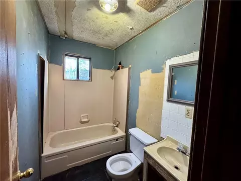 Bath - 322 4th St E, Atmore, AL 36502 photo 1 of 2