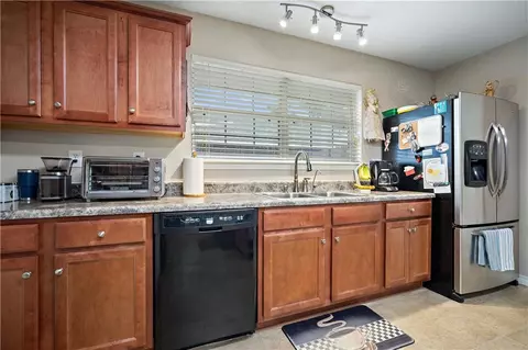 Kitchen - 5169 Mossberg Dr E, Theodore, AL 36582 photo 3 of 5