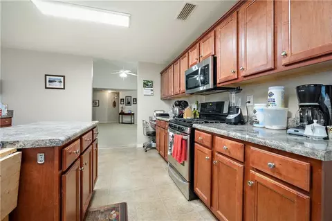 Kitchen - 5169 Mossberg Dr E, Theodore, AL 36582 photo 4 of 5