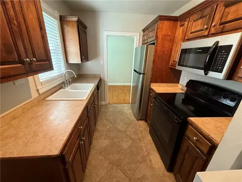 Kitchen - 214 Upham St #4C, Mobile, AL 36607 photo 2 of 3