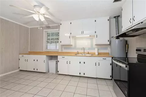 Kitchen - 102 5th St, Chickasaw, AL 36611 photo 1 of 2