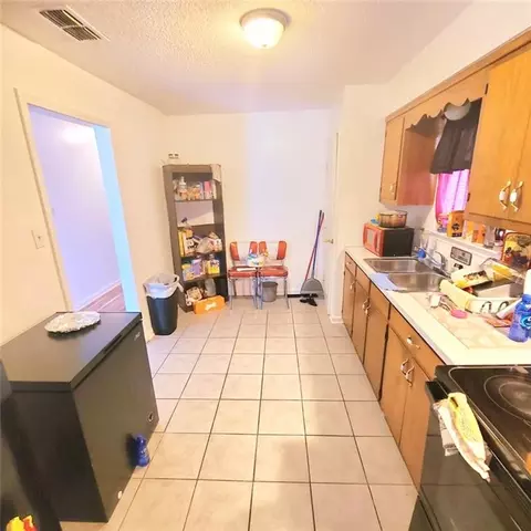 Kitchen - 220 Sinclair Ave, Mobile, AL 36610 photo 3 of 3