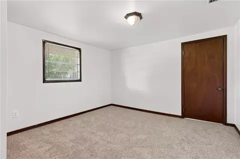 Bedroom - 8870 Broadus Loop Rd, Eight Mile, AL 36613 photo 7 of 9