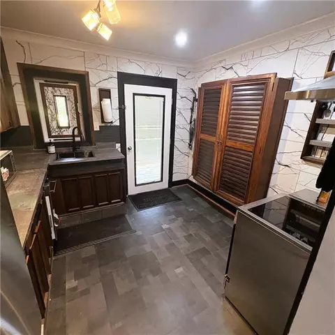 Kitchen - 103 E Tally Ct, Mobile, AL 36606 photo 2 of 5