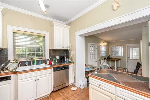 Kitchen - 142 Florence Pl, Mobile, AL 36607 photo 3 of 5