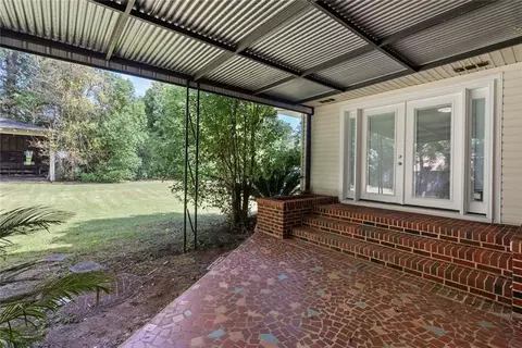 Exterior - 112 Sutherland Dr, Chickasaw, AL 36611 photo 3 of 11