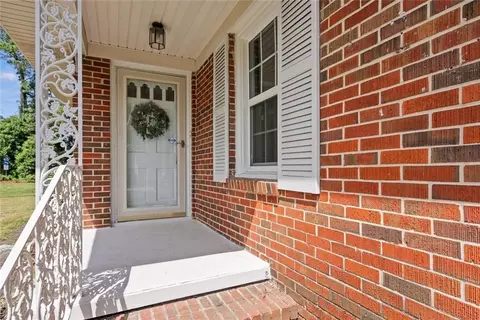 Exterior - 112 Sutherland Dr, Chickasaw, AL 36611 photo 2 of 11
