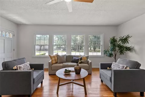 Living - 112 Sutherland Dr, Chickasaw, AL 36611 photo 1 of 7