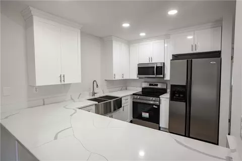 Kitchen - 10430 Lott Rd, Chunchula, AL 36521 photo 2 of 2