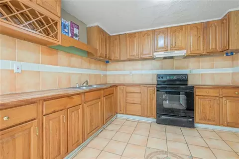 Kitchen - 705 Stanton Rd, Mobile, AL 36617 photo 1 of 5