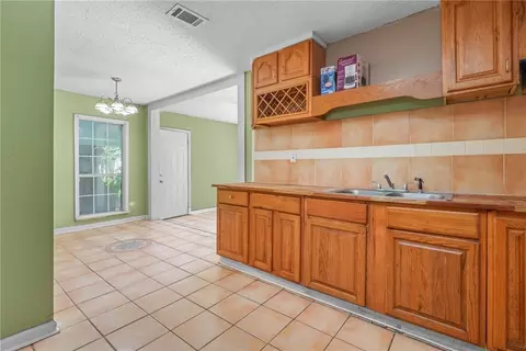 Kitchen - 705 Stanton Rd, Mobile, AL 36617 photo 3 of 5