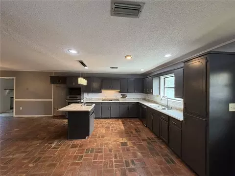 Kitchen - 512 5th Ave, Chickasaw, AL 36611 photo 2 of 3