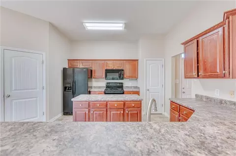 Kitchen - 8825 Spring Grv N, Mobile, AL 36695 photo 1 of 4