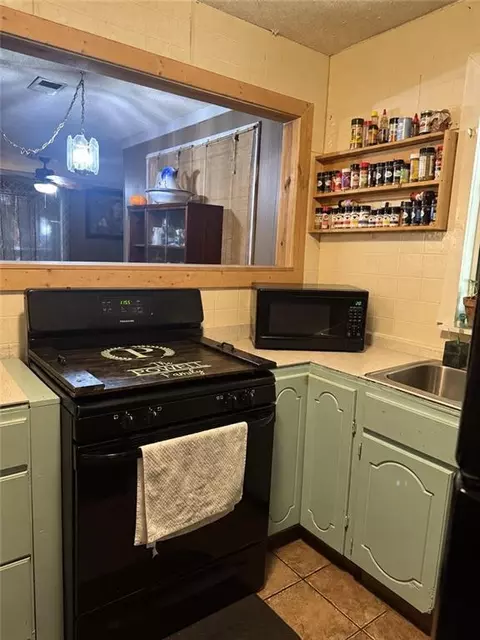 Kitchen - 609 Mandrell St, Mobile, AL 36606 photo 1 of 2