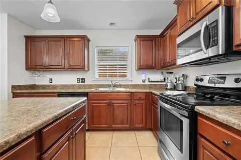 Kitchen - 8916 Spring Grv N, Mobile, AL 36695 photo 2 of 3