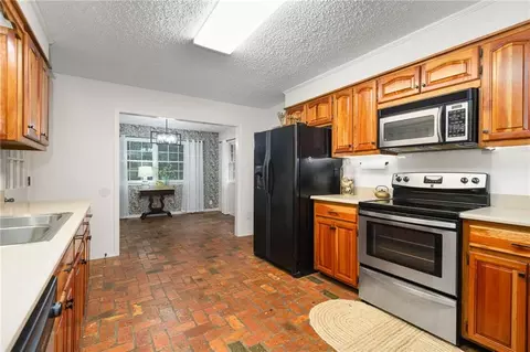 Kitchen - 5575 Mccrary Rd, Semmes, AL 36575 photo 4 of 4