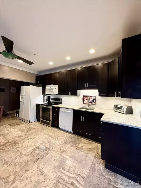 Kitchen - 320 Tulip Dr, Equality, AL 36026 photo 8 of 8