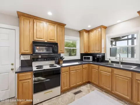 Kitchen - 228 Sears Bluff Rd, Eclectic, AL 36024 photo 2 of 3