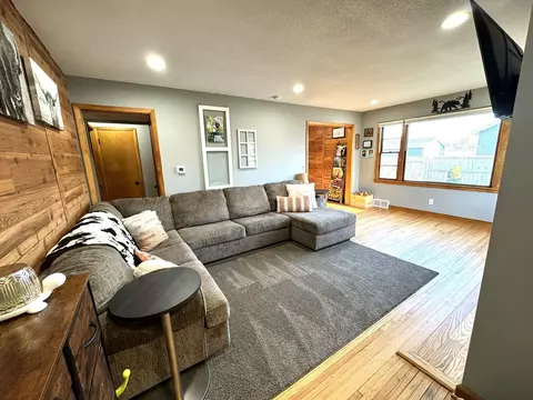 Living - 209 S 7th St, Olivia, MN 56277 photo 1 of 4