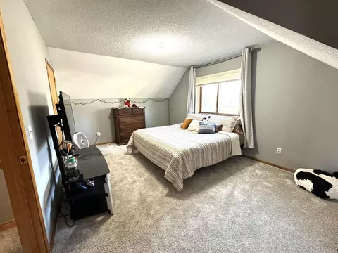 Bedroom - 209 S 7th St, Olivia, MN 56277 photo 1 of 6